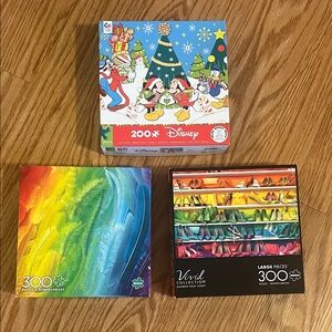 Lot of 3 Puzzles - Gently used but all pieces included- Disney Holiday